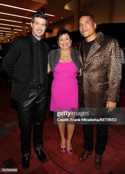 Robin Thicke , BET Chairman and CEO Debra Lee, and Centric Executive Vice President and General Manager Paxton Baker at the 2009 Soul Train Awards at...