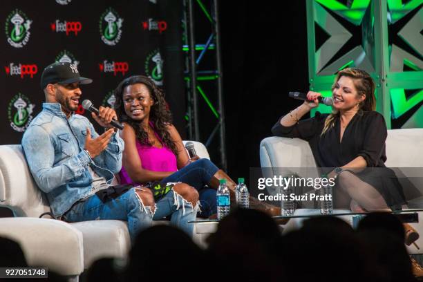 Actors Ricky Whittle and Yetide Badaki of TV show American Gods speak with Clare Kramer at Emerald City Comic Con at Washington State Convention...