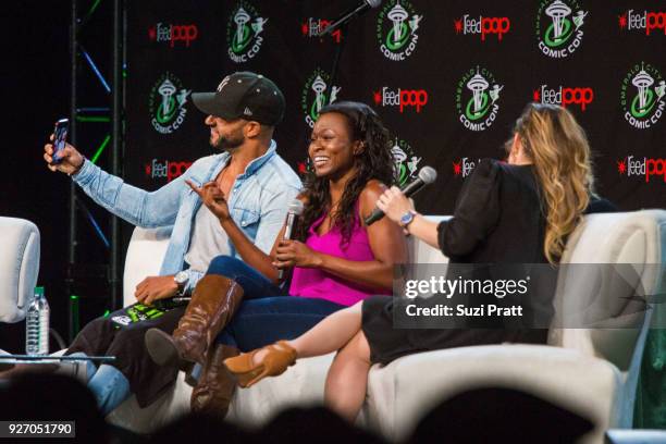 Actors Ricky Whittle and Yetide Badaki of TV show American Gods speak with Clare Kramer at Emerald City Comic Con at Washington State Convention...