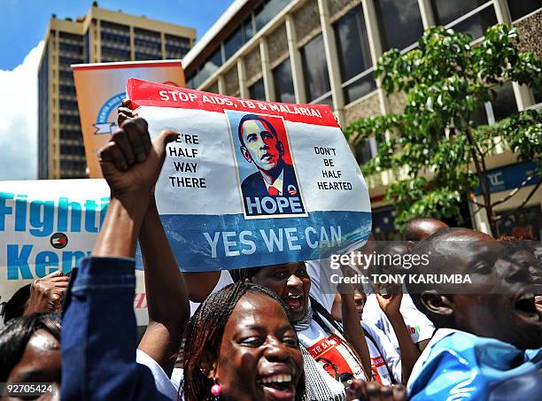 Kenyans hold a procession on November 4, 2009 on the sidelines of the fifth Multilateral Initiative on Malaria conference in the Kenyan capital...