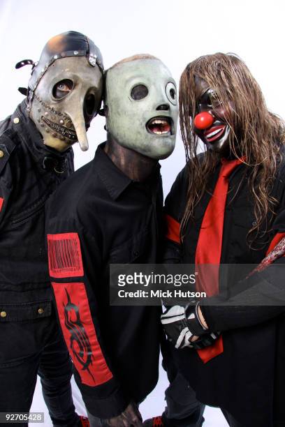 Chris Fehn , Corey Taylor and Shawn Crahan of Slipknot pose for a studio portrait session backstage at the Download Festival, Donington Park,...