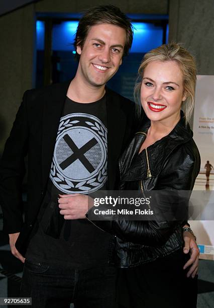 Actress Jessica Marais and Alex Fisher arrive for the premiere of "The Boys Are Back" at Dendy Opera Quays on November 4, 2009 in Sydney, Australia.