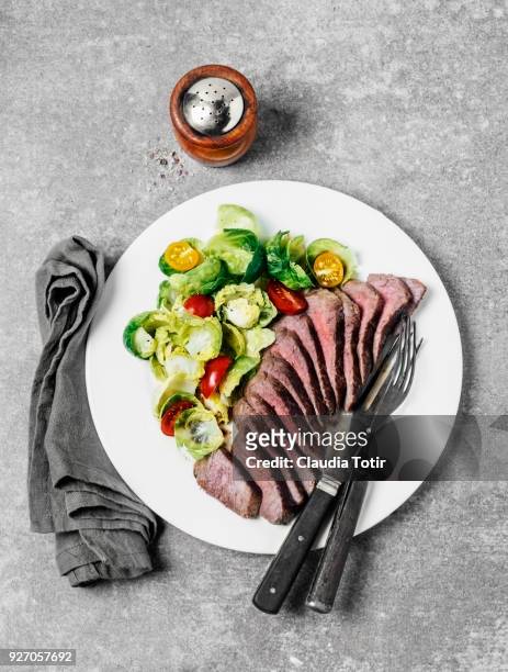 steak with salad - paleo diet stock pictures, royalty-free photos & images