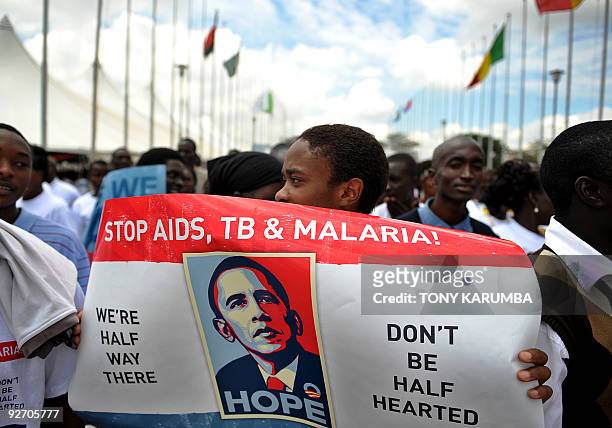 Kenyans hold a procession on November 4, 2009 on the sidelines of the fifth Multilateral Initiative on Malaria conference in the Kenyan capital...