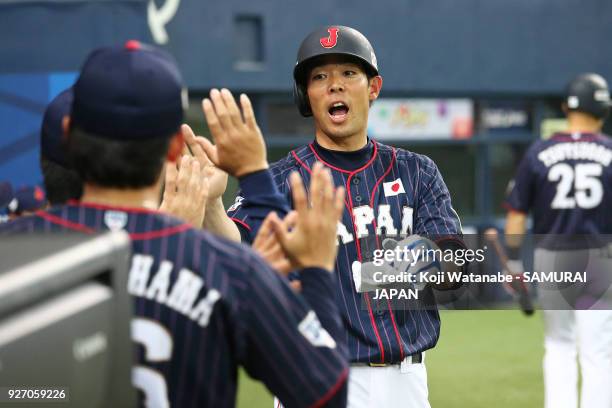 Shogo Akiyama of Japan celerates after scoring in the top half of the sixth inning during the game two of the baseball international match between...