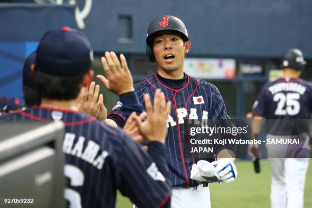 Shogo Akiyama of Japan celerates after scoring in the top half of the sixth inning during the game two of the baseball international match between...