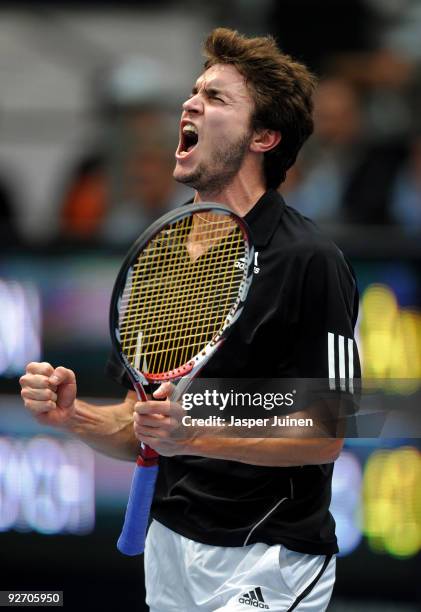 Gilles Simon of France celebrates his win in his second round match against Tomas Berdych of the Czech Republic during the ATP 500 World Tour...