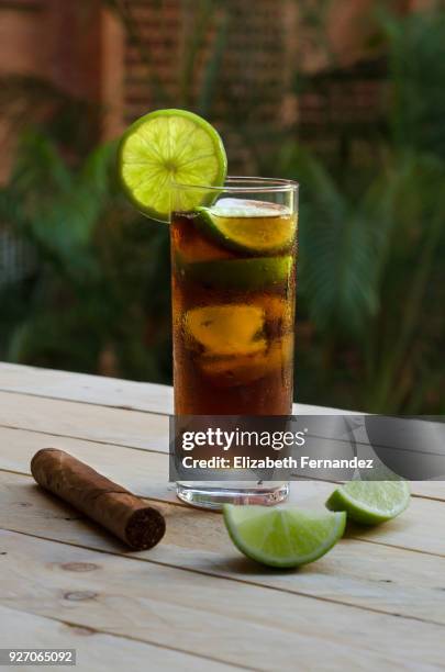 cuba libre and fine cuban cigar - havana cocktail stock pictures, royalty-free photos & images