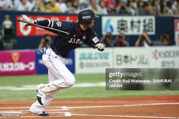 Shogo Akiyama of Japan one-run double in the top half of the sixth inning during the game two of the baseball international match between Japan and...