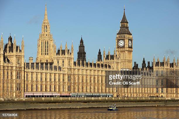 Police boat passes in front of the Houses of Parliament on November 3, 2009 in London, England. A review into MP's expenses published today by Sir...