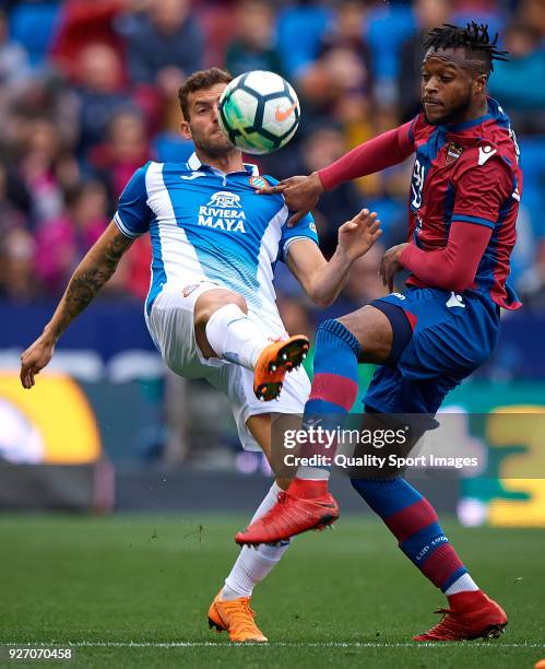 Cheik Doukoure of Levante competes for the ball with Leo Baptistao of Espanyol during the La Liga match between Levante and Espanyol at Ciutat de...