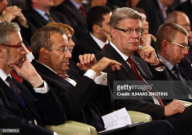 President of Latvia Valdis Zatlers and Toomas Hendrik Ilves, President of Estonia listen during the opening discussion panel of the fourth Riga...