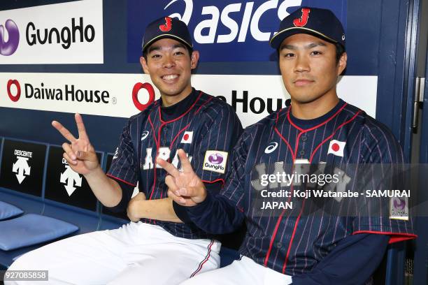 Shogo Akiyama and Takahiro Norimoto of Japan celerates after winning during the game two of the baseball international match between Japan and...