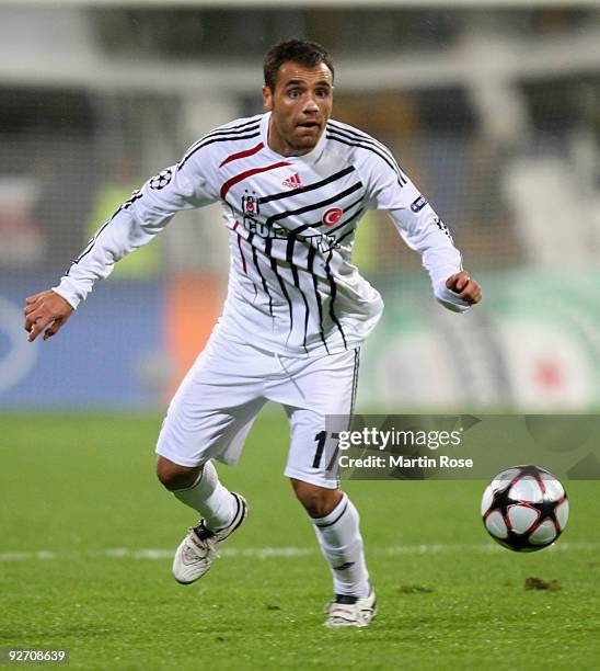 Ekrem Dag of Besiktas runs with the ball during the UEFA Champions League Group B match between Besiktas and VfL Wolfsburg at the Inoenue stadium on...