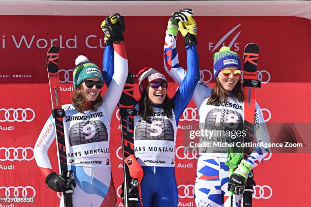 Michelle Gisin of Switzerland takes 2nd place, Federica Brignone of Italy takes 1st place, Petra Vlhova of Slovakia takes 3rd place during the Audi...