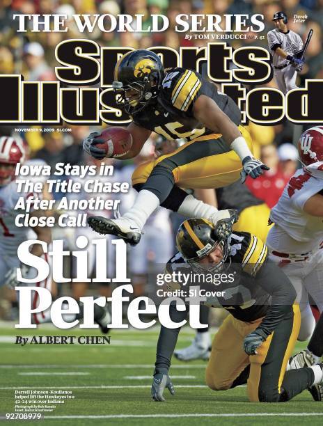 November 9, 2009 Sports Illustrated via Getty Images Cover: College Football: Iowa Derrell Johnson-Koulianos in action, jumping over teammate Wade...