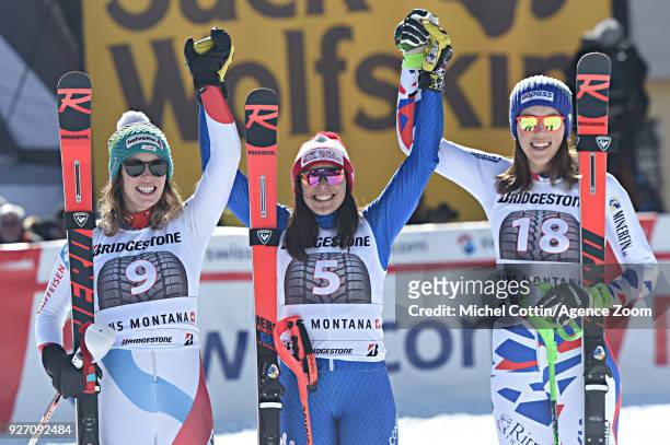 Michelle Gisin of Switzerland takes 2nd place, Federica Brignone of Italy takes 1st place, Petra Vlhova of Slovakia takes 3rd place during the Audi...
