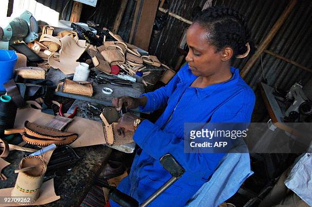 Ethiopian Shemsia Hiyar one of the beneficiaries of the International Labor Organization's programs for the disabled in Ethiopia, works in her small...