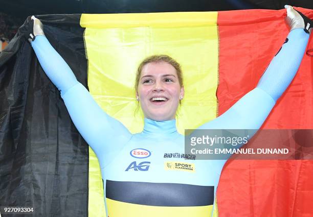 Belgium's Nicky Degrendele celebrates winning the women's keirin final during the UCI Track Cycling World Championships in Apeldoorn on March 4, 2018.