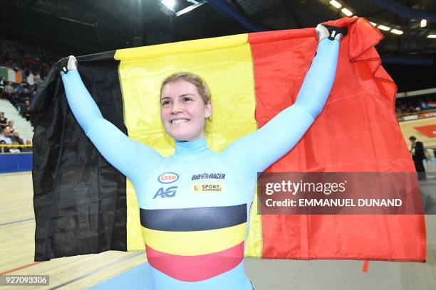 Belgium's Nicky Degrendele celebrates winning the women's keirin final during the UCI Track Cycling World Championships in Apeldoorn on March 4, 2018.