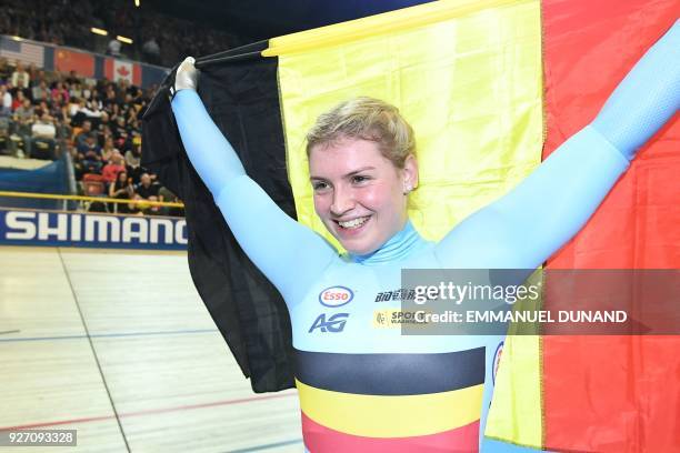 Belgium's Nicky Degrendele celebrates winning the women's keirin final during the UCI Track Cycling World Championships in Apeldoorn on March 4, 2018.