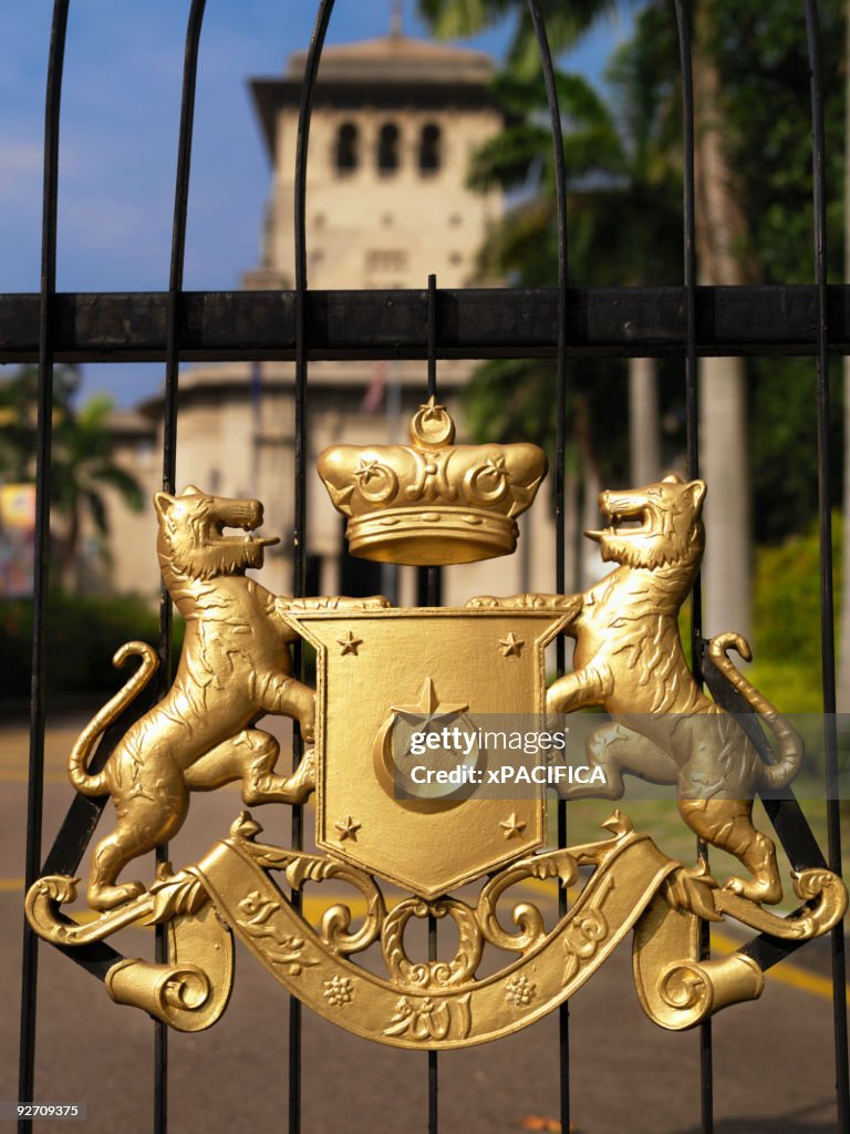 The seal of Johor embellishing a gate.