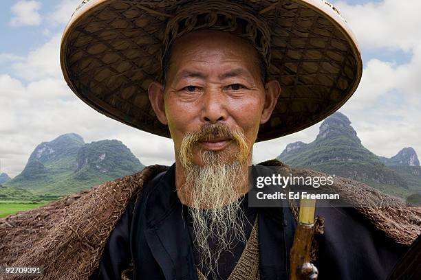 traditional chinese fisherman - asian style conical hat stock pictures, royalty-free photos & images