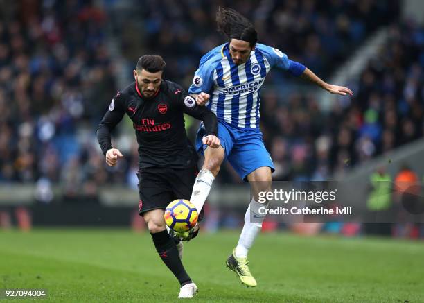 Matias Ezequiel Schelotto of Brighton and Hove Albion and Sead Kolasinac of Arsenal in action during the Premier League match between Brighton and...