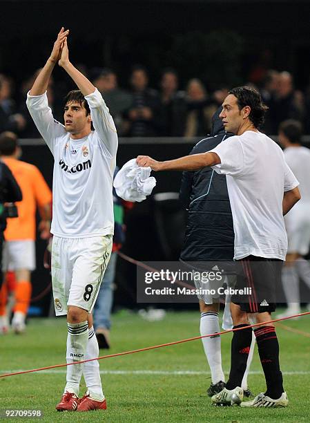 Ricardo Kaka of Real Madrid greets his forer fans of AC Milan after the UEFA Champions League group C match between AC Milan and Real Madrid at the...