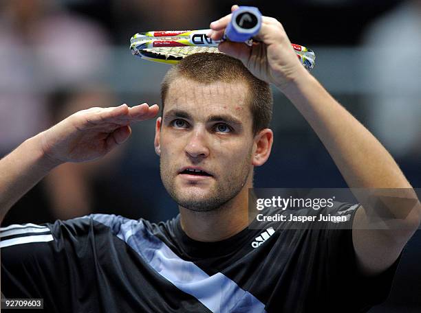 Mikhail Youzhny of Russia reacts, after his opponent Jo-Wilfried Tsonga of France pulled out of the match due to an injury, reaching the second round...