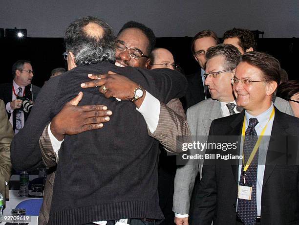 Sergio Marchionne , Chrysler Group LLC Chief Executive Officer and Fiat CEO, hugs United Auto Workers Vice President General Holiefield as arrives to...