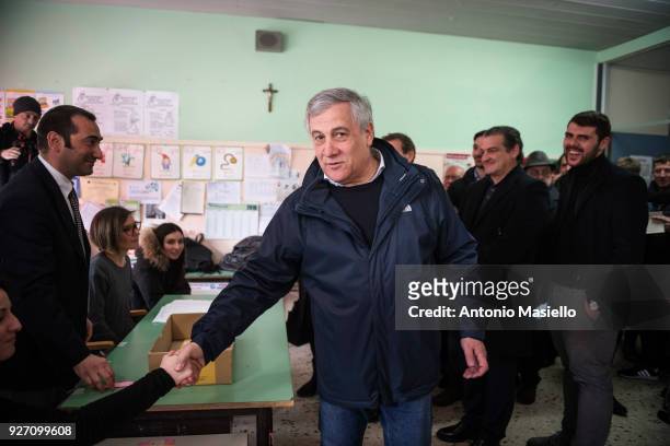 European Parliament President, Antonio Tajani, candidate for the center-right Forza Italia political party, goes to vote at a polling station on on...
