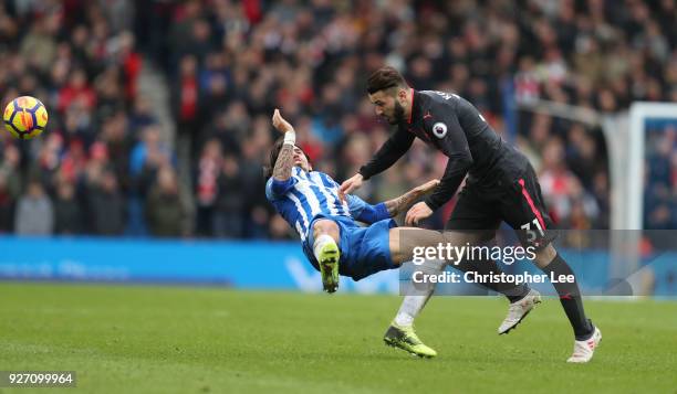 Sead Kolasinac of Arsenal clashes with Matias Ezequiel Schelotto of Brighton and Hove Albion during the Premier League match between Brighton and...