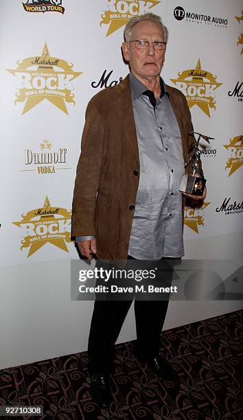 Former Cream drummer Ginger Baker, with his Innovator award, attends the Classic Rock Hall of Fame Awards at the Park Lane Hotel on November 2, 2009...