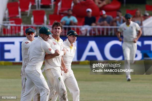 Australia's bowler Mitchell Marsh celebrates taking the wicket of South Africa's batsman Aiden Markram during the fourth day of the first Test...