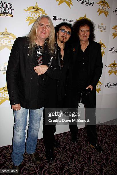 Biff Byford of Saxon, Tony Iommi of Black Sabbath and Brian May of Queen attend the Classic Rock Hall of Fame Awards at the Park Lane Hotel on...