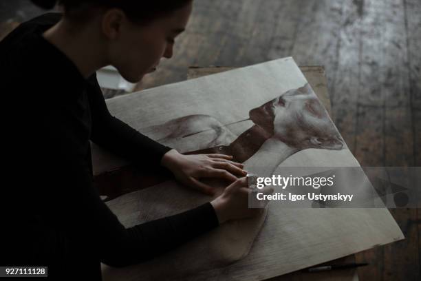 close-up of focused female artist sketching - ukraine people stock pictures, royalty-free photos & images