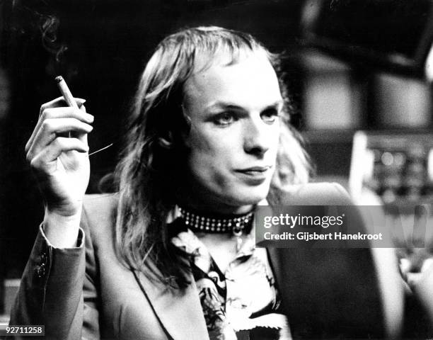 Brian Eno relaxes with a cigarette at Air Studios, London in 1973