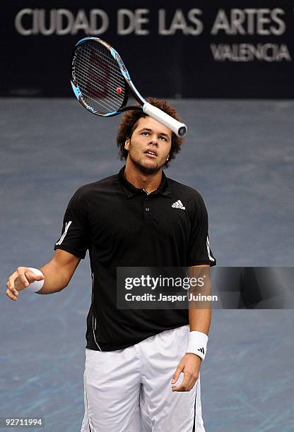 Jo-Wilfried Tsonga of France juggles his racket in first round match against Mikhail Youzhny of Russia during the ATP 500 World Tour Valencia Open...