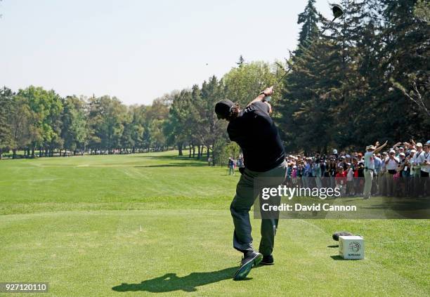 Phil Mickelson of the United States plays a driver from the second tee during the third round of the World Golf Championships-Mexico Championship at...