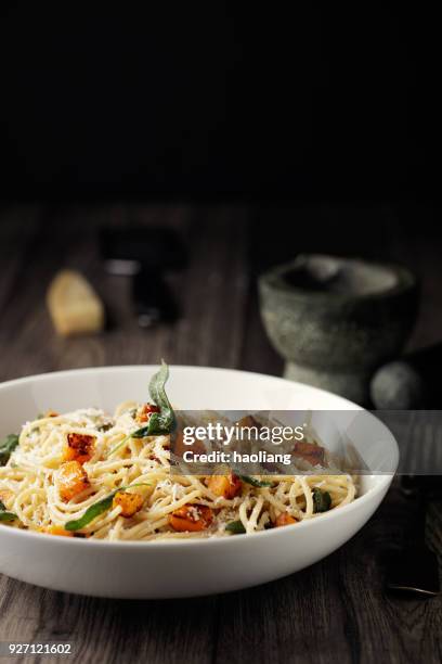 healthy spaghetti with roasted butternut squash and sage butter - spaghetti squash stock pictures, royalty-free photos & images