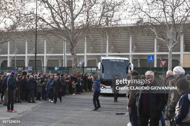 The bus of Italian Serie A football team Fiorentina arrives at the stadium, on March 4, 2018 in Florence after their game was cancelled due to the...
