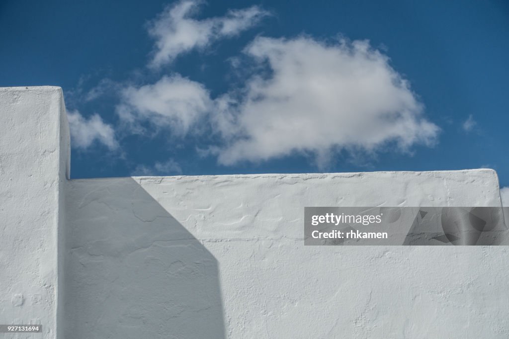 White wall and clouds, Lanzarote, Canary Islands, Spain