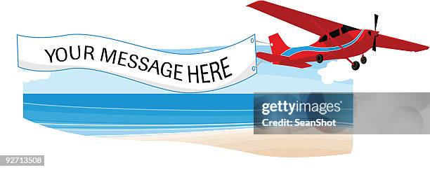 Flying Sign Beach Plane Sign Photos and Premium High Res Pictures - Getty Images