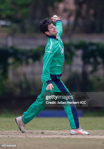 George Dockrell of Ireland bowls during the ICC Cricket World Cup Qualifier between Ireland and The Netherlands at The Old Hararians Ground on March...