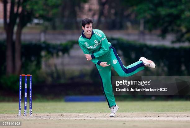 George Dockrell of Ireland bowls during the ICC Cricket World Cup Qualifier between Ireland and The Netherlands at The Old Hararians Ground on March...