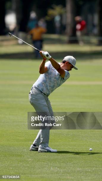 Rickie Fowler plays his second shot into th eight green during the third round of World Golf Championships-Mexico Championship at Club de Golf...
