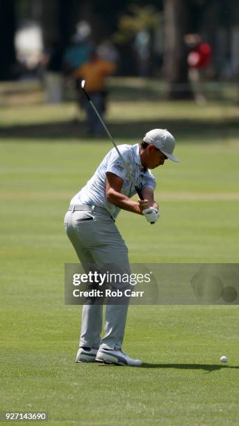 Rickie Fowler plays his second shot into th eight green during the third round of World Golf Championships-Mexico Championship at Club de Golf...