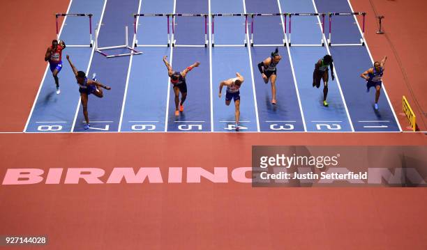 Gold Medallist, Andrew Pozzi of Great Britain dips for the line to win the Men's 60 Metres Hurdles Final during the IAAF World Indoor Championships...