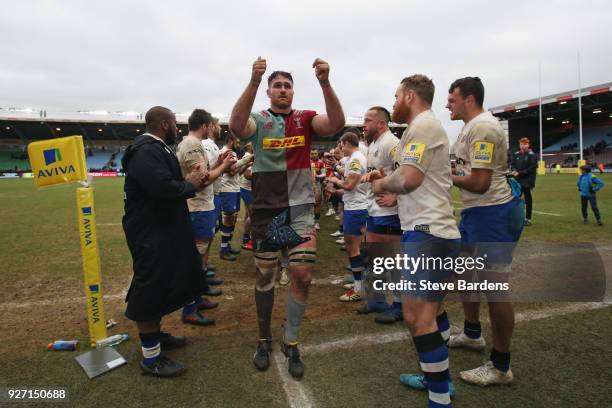 James Horwill of Harlequins celebrates as he leads his team off the field after the Aviva Premiership match between Harlequins and Bath Rugby at...